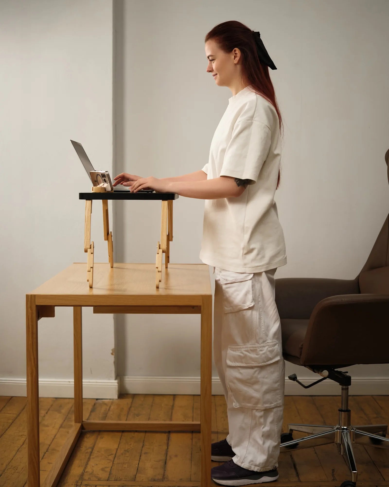 Working standing at a regular desk with TablePro raised to a comfortable height.